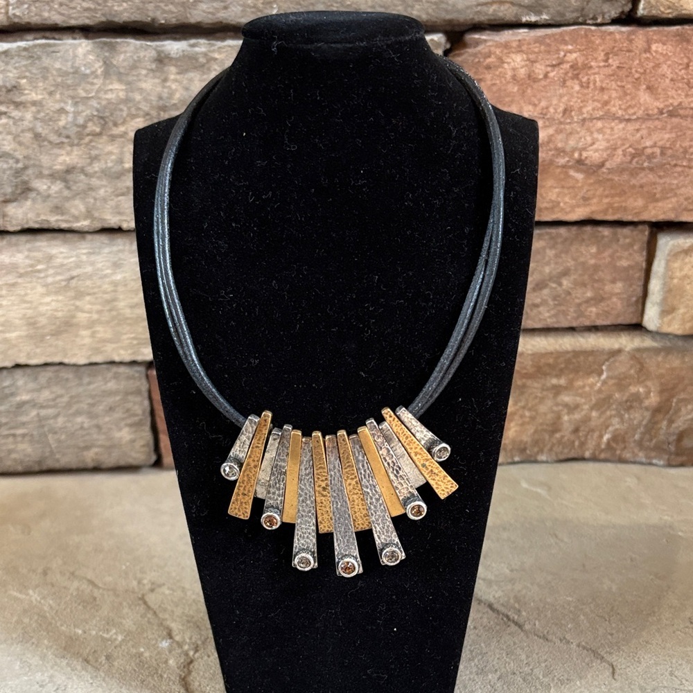 Chico’s mixed metal on black cord necklace